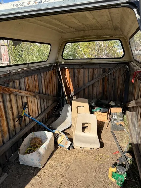 Pallet Structure with Topper and Contents Inlcuding Boat Seats, Trimmer, Hardware