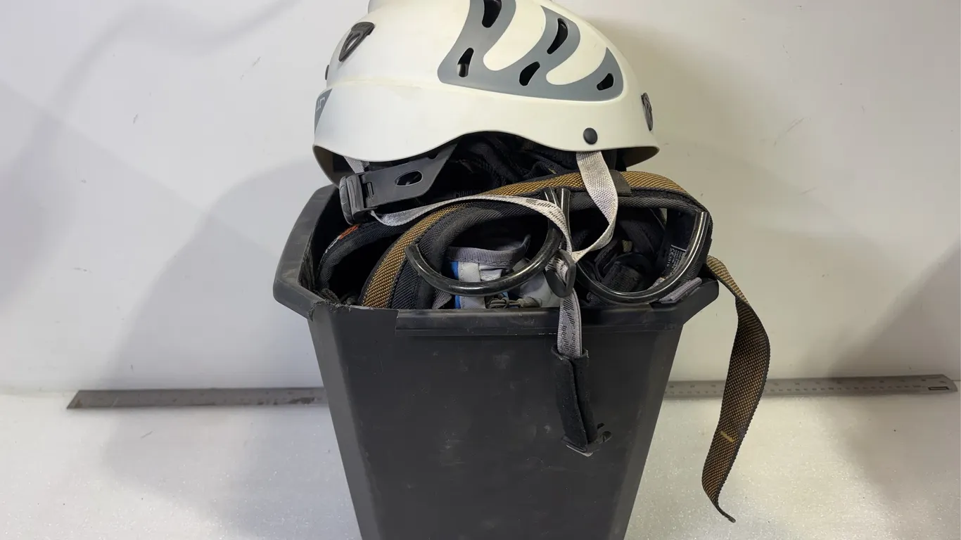 Bin of Assorted Climbing Gear, Helmet, Gloves, Shoes, Harness, Ect, Approx. 7 Items *Unreserved*