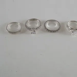 Lot of (4) Rings w/Clear Stones