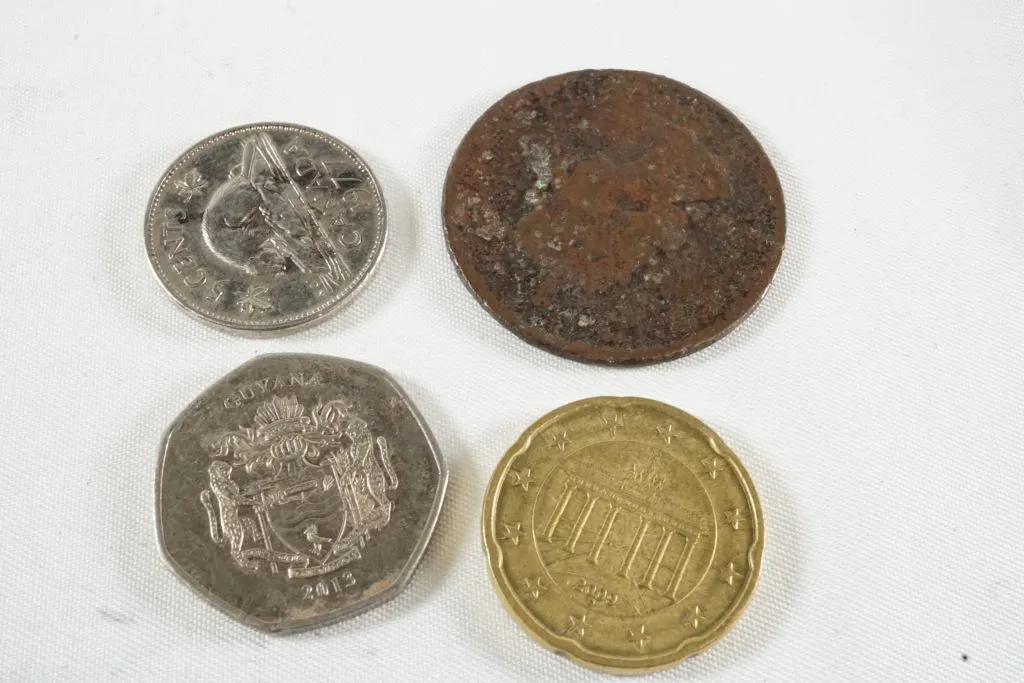 Lot of (4) Foreign Coins