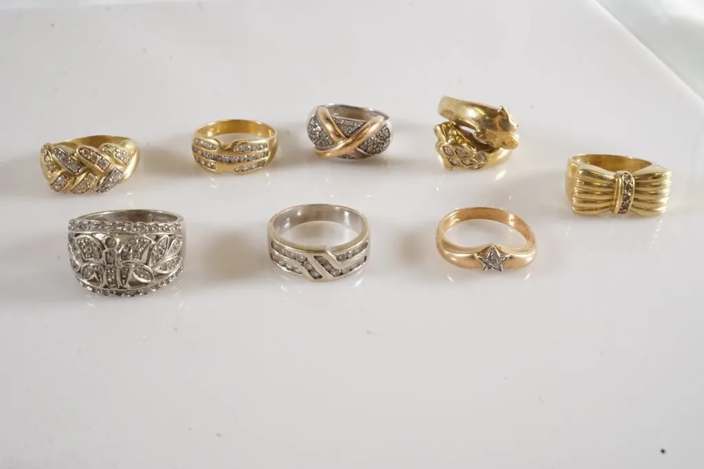 Lot of (8) 18k Gold Rings w/Clear Stones