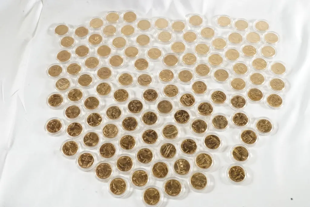 Lot of (111) State Quarters in Plastic Sleeves