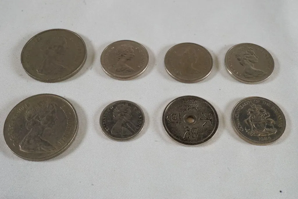 Lot of (8) Foreign Coins