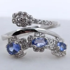 0.6 CT CERTIFIED SILVER TANZANITE GEMSTONE ($1,900 APPRAISAL)