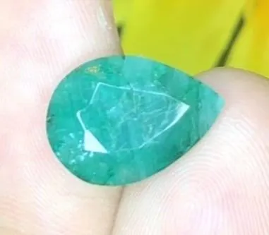 5.7 CT CERTIFIED BRAZILIAN EMERALD GEMSTONE ($3,650 APPRAISAL)