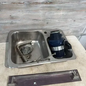 Stainless steel sink with garburator