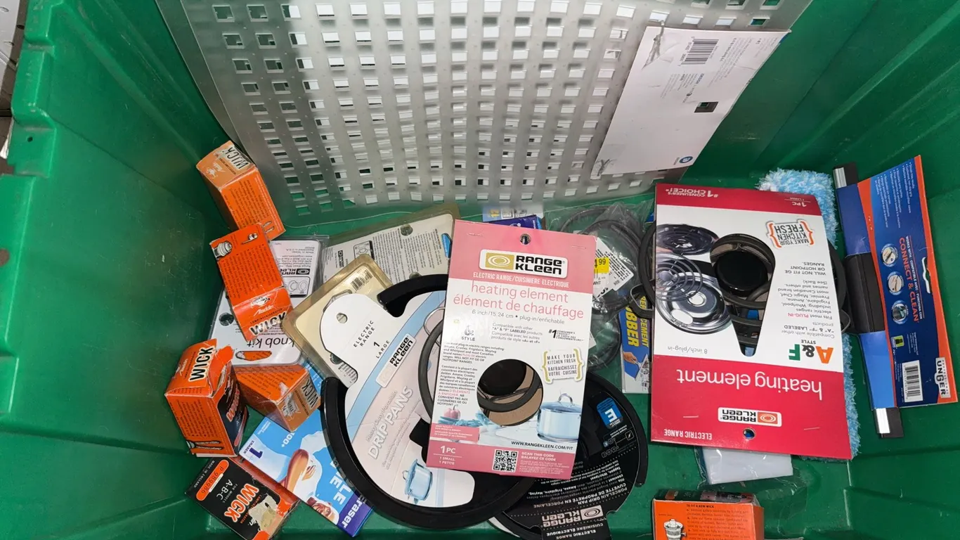 Lots of miscellaneous kitchen parts, including oven, drip pans, refrigerator, lightbulbs, and heatin