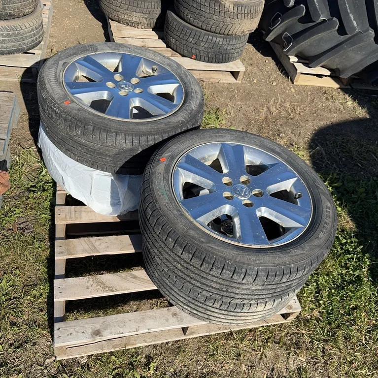 4 tires on rims - off of a 2009 Dodge Journey