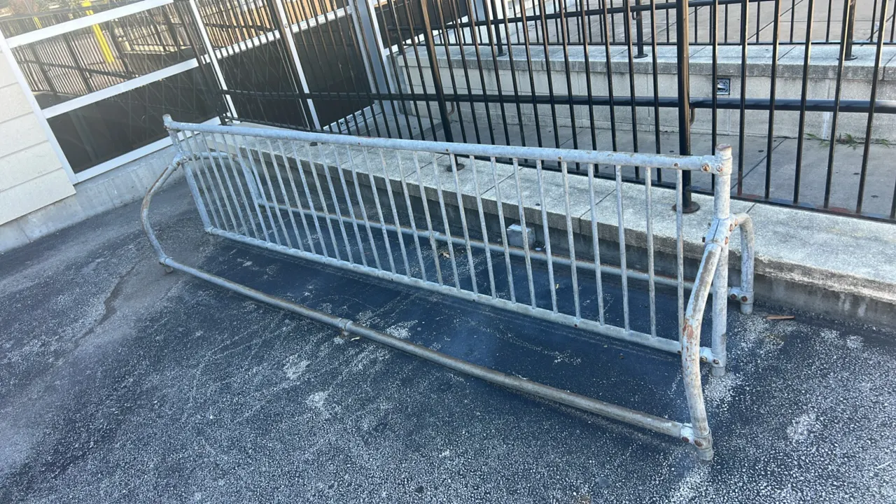 Galvanized steel bike rack. Features tubular frame construction with dual-sided parking slots. 10'L. Freestanding design.