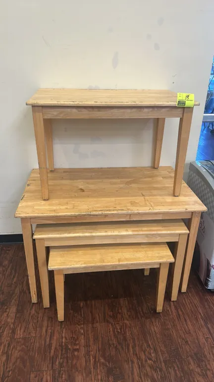Wooden nesting tables. Set of (3) nesting display tables featuring butcher block style wood tops and square wood legs. Dimensions: 48" x 30", 40" x 24