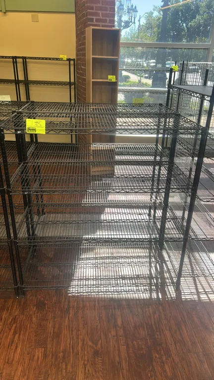 Metro wire shelving rack. Features (5) adjustable wire shelves in a black finish. Dimensions: 48"W x 20"D.