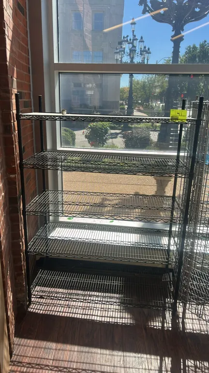 Metro multi-tier metal wire rack. Features (5) wire shelves in a black finish. Dimensions: 48" x 20".
