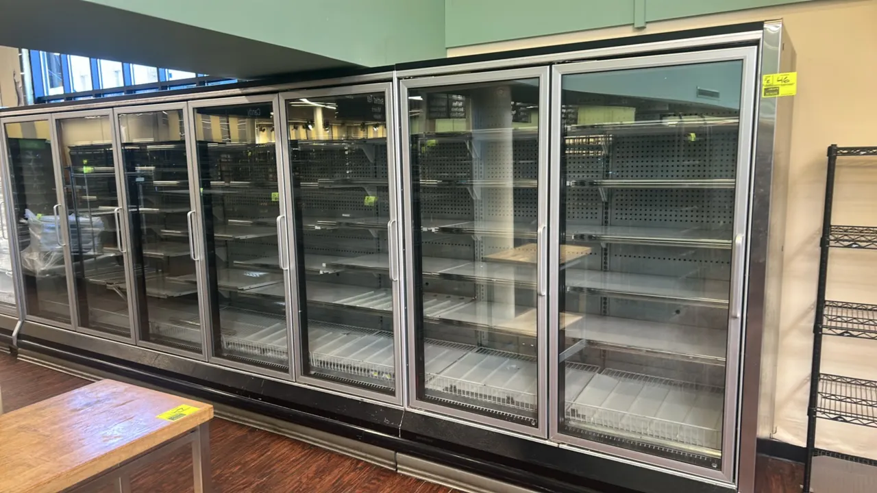 2000 Hussmann RL-2 U frozen food glass doors. Features adjustable solid shelving and interior lighting. Electrical: 120/208V, 1-Phase. Note: For remot