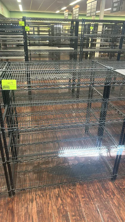 Metro multi-tier metal wire shelving racks. Features (5) adjustable wire shelves in a black finish. Dimensions: 48" x 20".