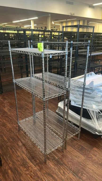 Metro wire shelving racks. Features 3-tier adjustable wire shelves. 36" x 14".