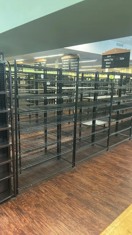 Metro metal wire multi-tier shelving racks. Features black wire construction and adjustable wire shelves on tubular upright posts with leveling feet.