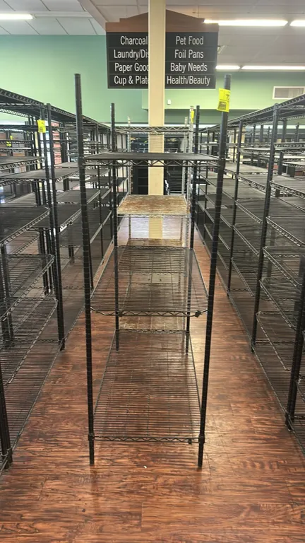 Metro metal wire shelving unit. Features (3) tiers of adjustable wire shelves, black epoxy finish, and a top shelf liner. Dimensions: 48"W x 24"D.