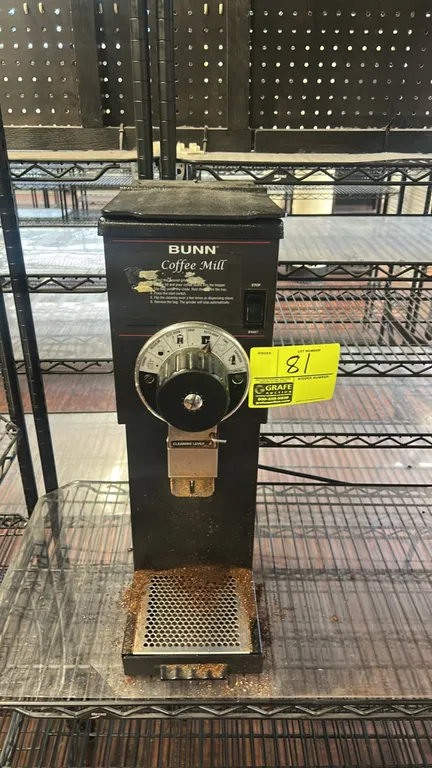 Bunn G1 HD bulk coffee grinder. Features 1 lb. hopper capacity, adjustable grind selector dial, bag holder with cleaning lever, and removable tray. S/