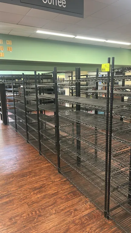 Metro multi-tier wire shelving racks. Features black finish and adjustable wire shelves. Dimensions: (3) 48" x 18" and (2) 36" x 18".