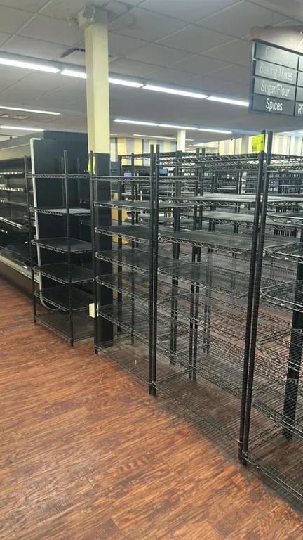 Metro metal wire multi-tier shelving racks. Features black wire finish and adjustable wire shelves. Dimensions: 36" x 18".