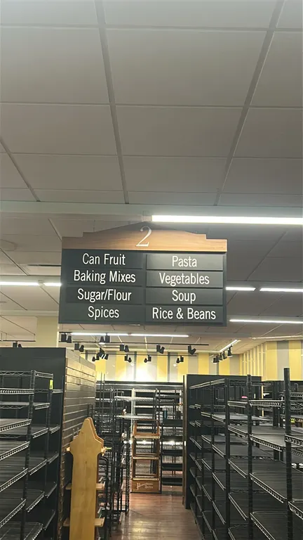Grocery store aisle markers numbered 2 through 6. Features wood-look decorative headers with aisle numbers, dual-column layout with interchangeable pr