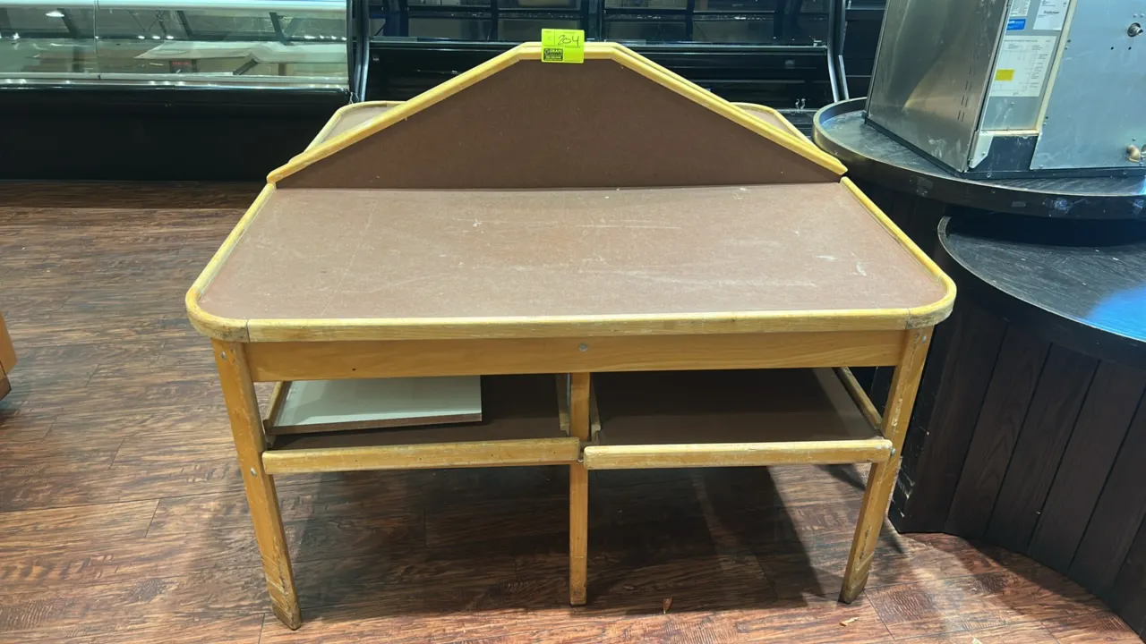 Wooden 2-tier bakery merchandisers. Features upper angled backboard, flat top display surface with raised edge trim, and lower open shelves. 60" x 30"