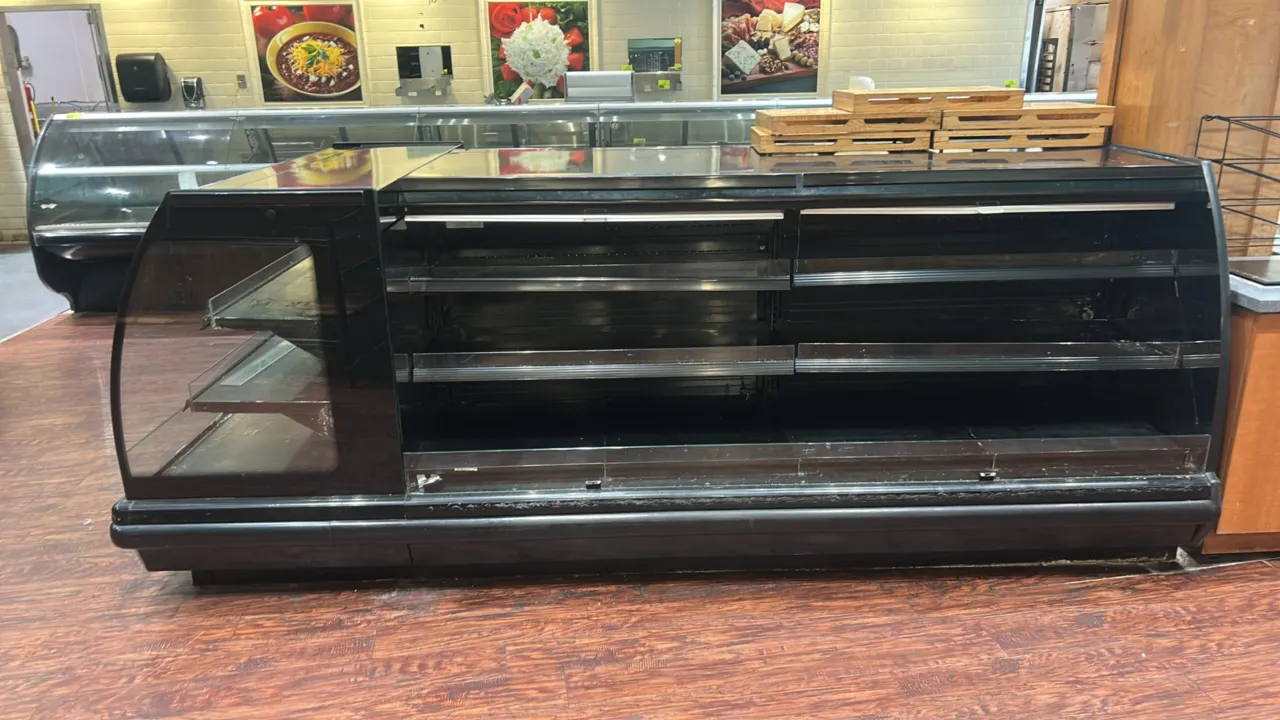 Hussmann IM-04-C8-R remote 3-sided multi-tier grab-and-go display case. Features multi-tier solid shelving with product retainers, interior lighting,