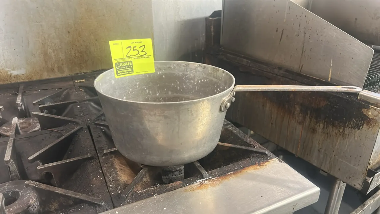 Aluminum stock pot. Features a single riveted handle with hanging hole. 10"Dia. Range not included.