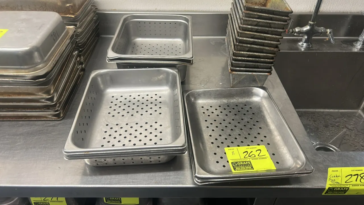 Stainless steel half-size perforated food insert pans. Features perforated bases and sidewalls for steaming and draining. Includes assorted depths of
