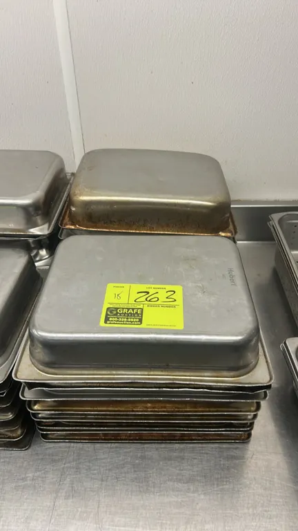 Hubert metal half-size insert pans. Features stainless steel construction. 3" depth.