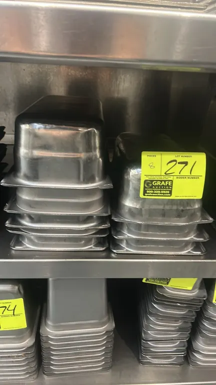 Metal 1/3-size food pan inserts. Features stainless steel construction. Dimensions: 4" deep.