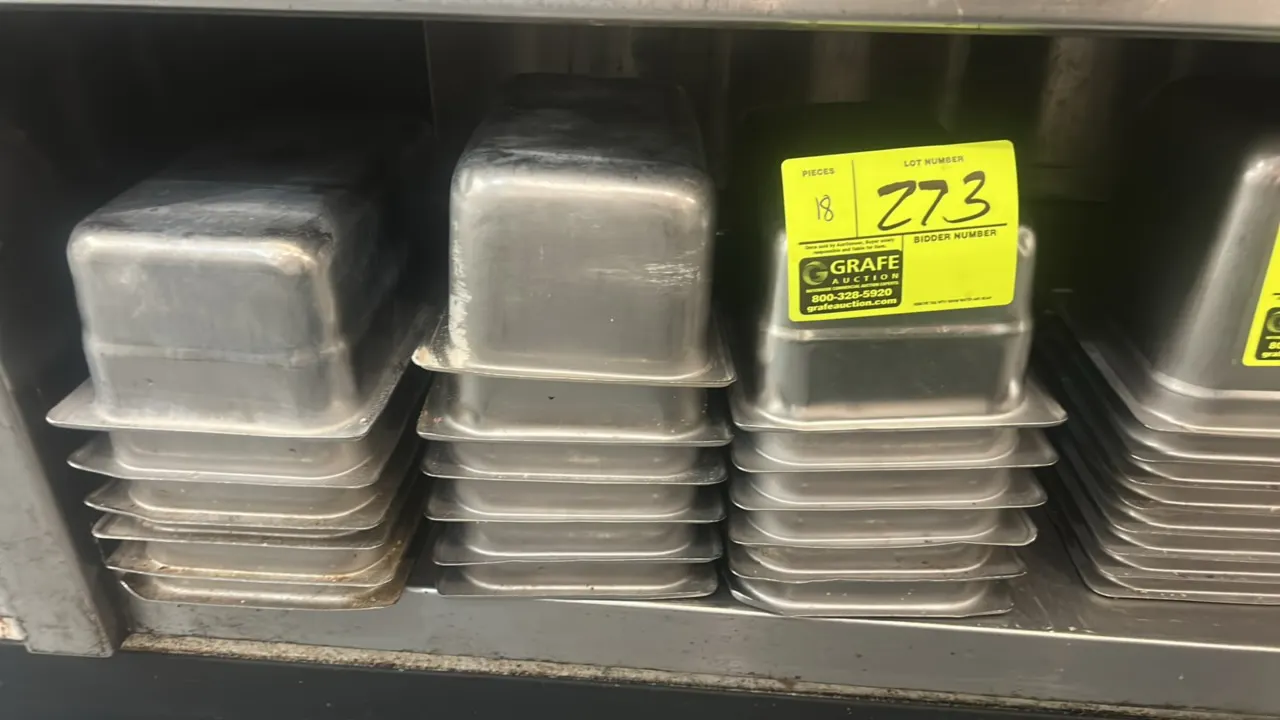 Metal 1/3-size food pan inserts. Features nesting design with rimmed edges for steam table or food prep rail mounting. Dimensions: 4" deep.