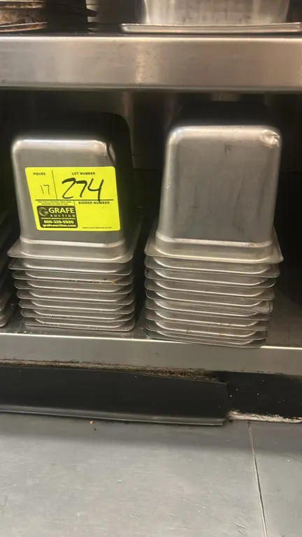 Stainless steel food pan inserts. Dimensions: 7" x 6" with 6" depth each.