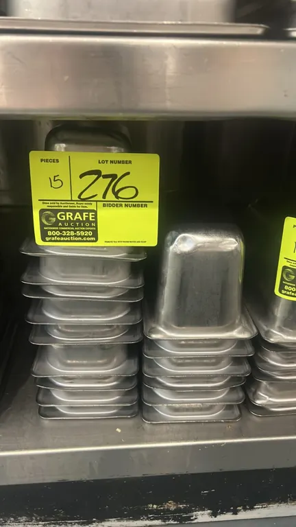 Metal food pan inserts. Features stainless steel construction. Dimensions: 7" x 4" with 4" depth.