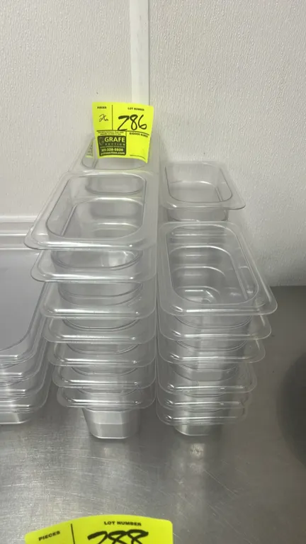 Polycarbonate food insert pans. Features clear plastic construction and stackable design. Dimensions: 7" x 4".