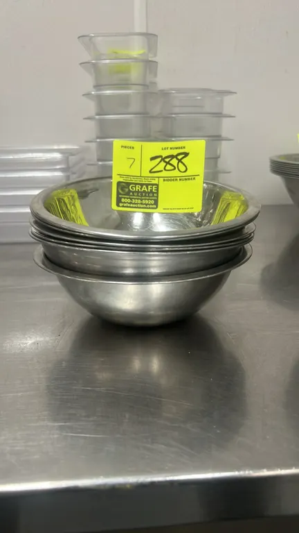 Stainless steel bowls. Features rolled rims and nesting design. Dimensions: 8"Dia. x 3"D each. Background items not included.