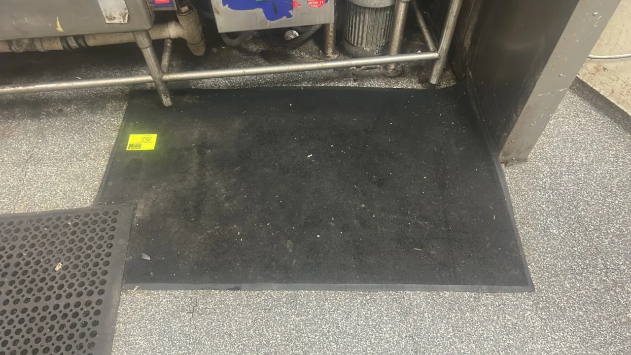 Floor mats. Includes (1) solid mat and (1) perforated drainage mat. Dimensions: 56" x 34" and 64" x 38".