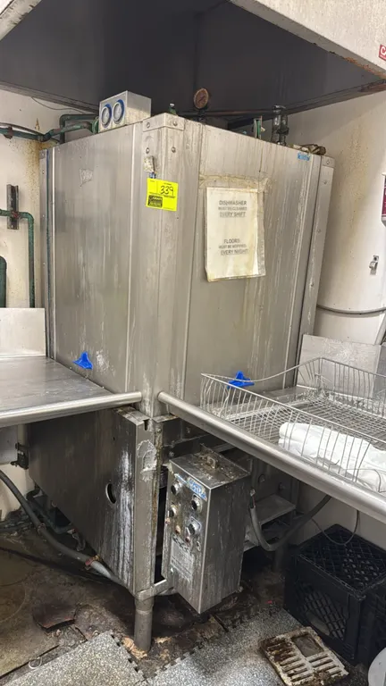 Stero stainless steel commercial dishwasher. Features stainless steel construction, door-type operation, top-mounted dual temperature gauges, 10 kW ta