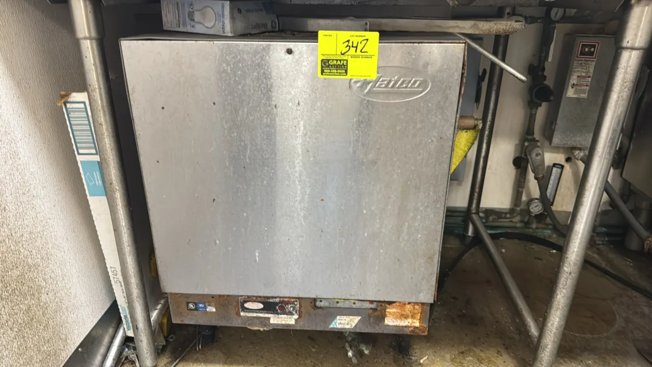 Hatco S-24 electric booster water heater. Features stainless steel housing and front-mounted power switch with indicator light. S/N: 9433990004. Elect