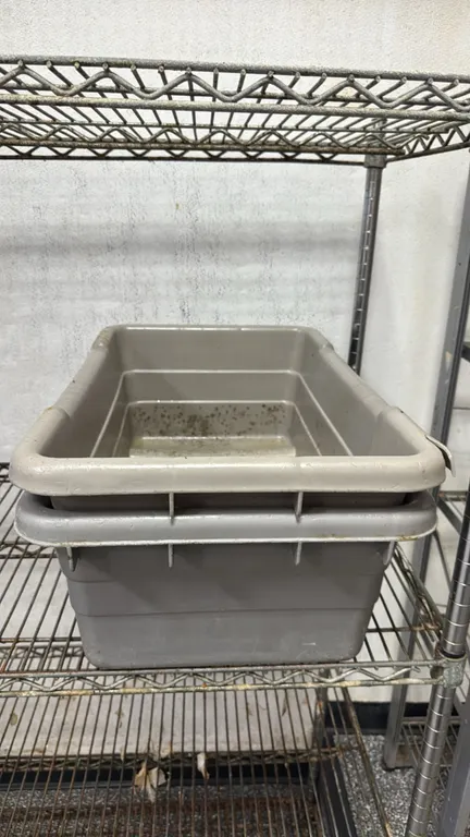 Polyethylene meat lugs. Features molded plastic construction with reinforced rim and nestable design. Wire shelving not included.