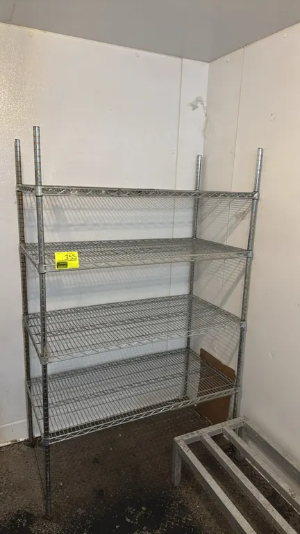4-tier wire shelving rack. Features (4) adjustable wire shelves and (4) metal upright posts. Dimensions: 4'L.