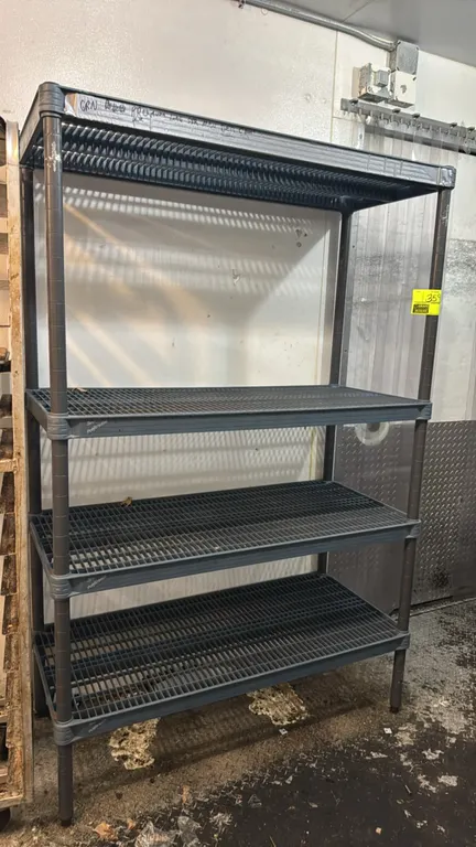 Metro 4-tier polymer shelving rack. Features 4 slotted polymer shelves and four upright posts. 4'L. Mounted on adjustable leveling feet.