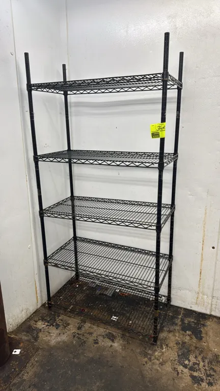 Metal 5-tier wire shelving rack. Features adjustable black wire shelves and (4) upright posts with leveling feet. Dimensions: 36"W x 18"D x 75"H.