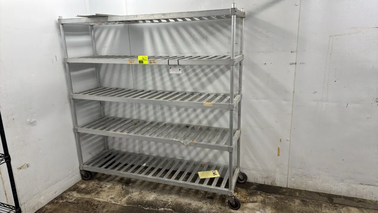 Aluminum 5-tier portable rack. Features slatted aluminum shelving. Dimensions: 72" x 20" x 74". Mounted on casters.