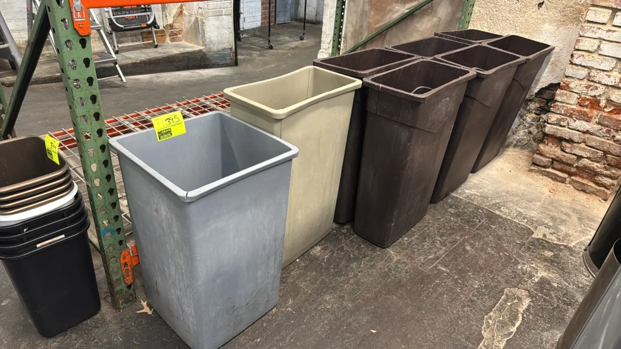 Assorted commercial poly trash cans. Features molded plastic construction in various styles and colors, including slim brown receptacles with internal
