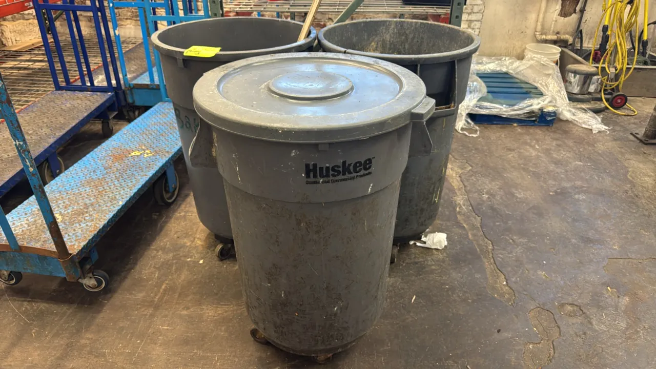 Huskee polyethylene trash cans. Features molded side handles and rolling caster dollies. Includes (1) lid. Contents not included.