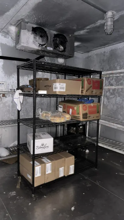 Metro black-coated multi-tier wire shelving racks. Includes (1) 4'L rack and (1) 3'L rack. Features adjustable wire shelving tiers on tubular upright