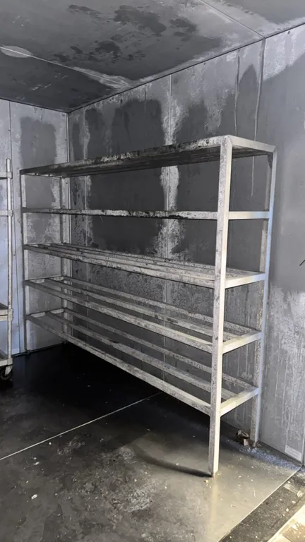 Aluminum 5-tier storage rack. Features tubular bar shelf construction with welded framework. Dimensions: 96" x 18" x 73". Stationary leg base. Cart in