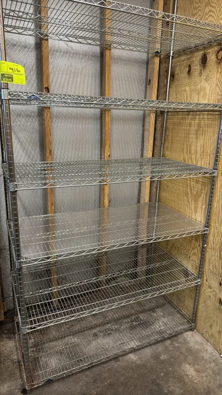 Metro 6-tier wire shelving rack. Features chrome finish and (6) adjustable wire shelves. Dimensions: 4' x 2' x 8'.