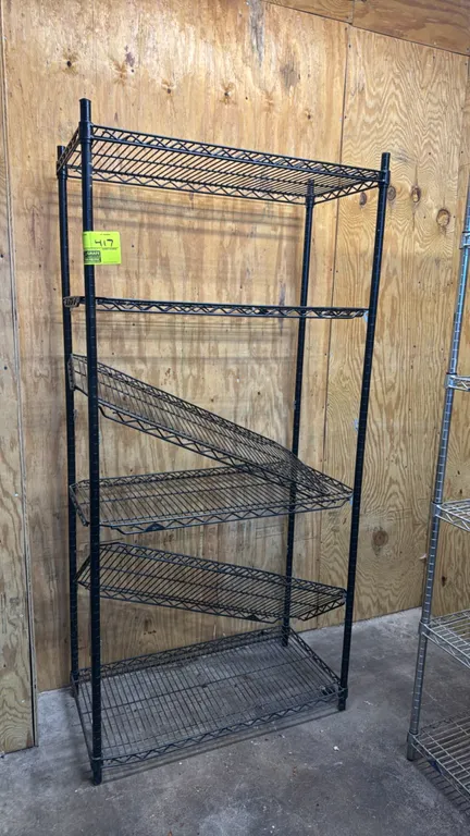 Metro 6-tier wire shelving rack. Features black coated metal wire construction with adjustable wire shelves. Dimensions: 37" x 18" x 74".